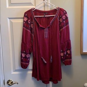 Maroon knit blouse with navy and pink accents